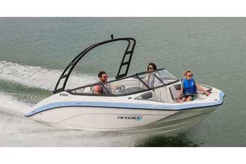 Slide: The Image of 2026 Yamaha Boats AR190 speeding on water with passengers enjoying the ride. - 13