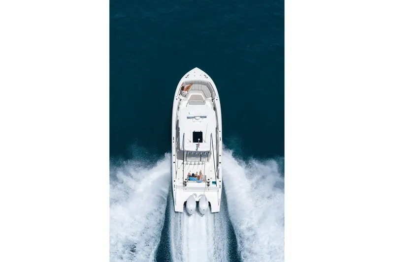 Slide: The Image of Overhead view of 2026 Pursuit S 358 Sport boat cruising on open water. - 2
