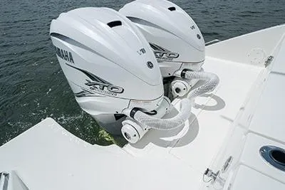 Slide: The Image of 2026 Pursuit S 358 Sport boat with dual Yamaha XTO outboard engines on water. - 5