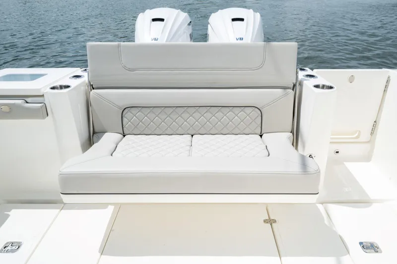 Slide: The Image of 2026 Pursuit S 358 Sport boat with luxurious seating and dual V8 engines. - 6