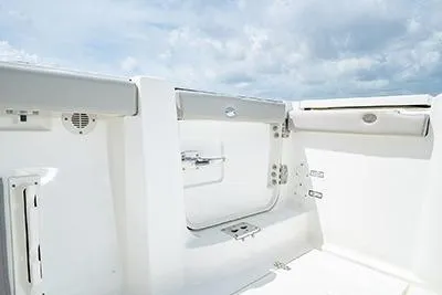 Slide: The Image of 2026 Pursuit S 358 Sport boat interior with sleek white design and modern features. - 7