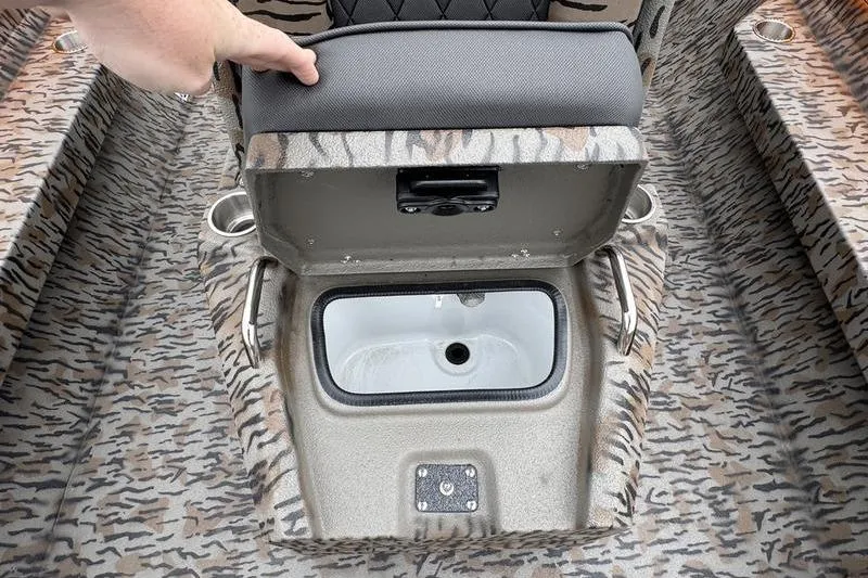 Slide: The Image of 2026 Xpress H22B Bay boat seat storage compartment with camouflage design. - 14