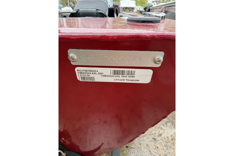 Slide: The Image of 2024 Tracker Bass Tracker Classic XL boat transom with identification plate and label. - 9