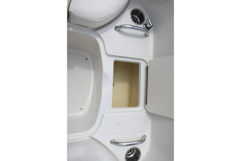 Slide: The Image of Storage compartment on a 2008 Sea Ray 260 Sundeck boat interior. - 19
