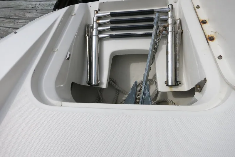 Slide: The Image of Anchor storage compartment on a 2008 Sea Ray 260 Sundeck boat. - 20