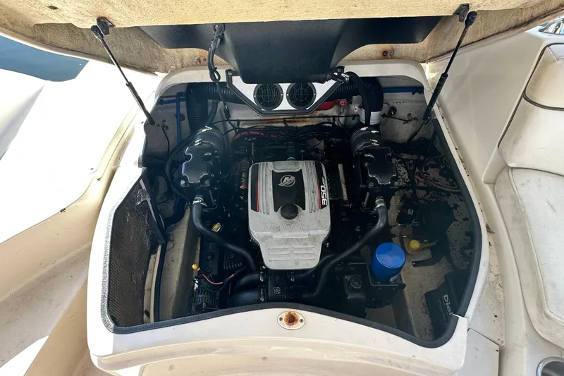 Slide: The Image of Engine compartment of a 2008 Sea Ray 260 Sundeck boat, showcasing the MerCruiser 350 engine. - 39