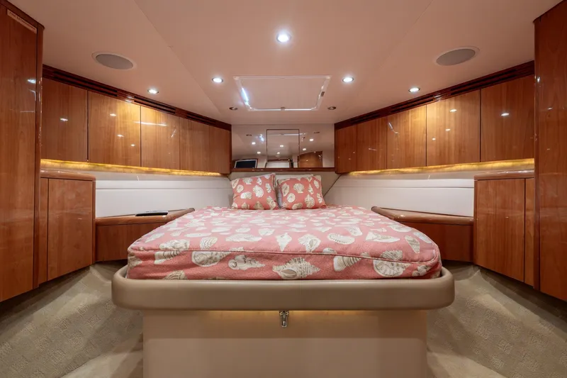 Slide: The Image of Luxurious cabin interior of 2004 Hatteras 60 Convertible yacht with elegant wood finishes. - 26