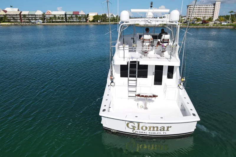 Slide: The Image of 2004 Hatteras 60 Convertible yacht on water, rear view, Coral Gables, Florida. - 32