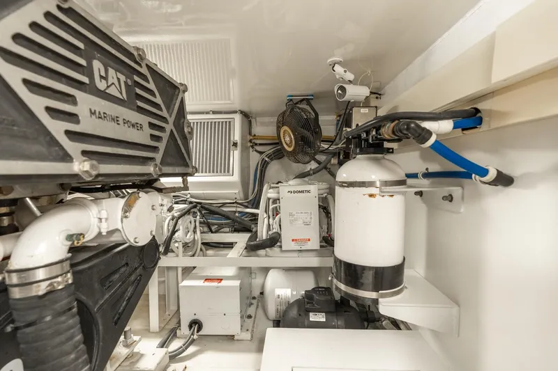 Slide: The Image of Engine room of 2004 Hatteras 60 Convertible yacht with CAT Marine Power engine. - 42