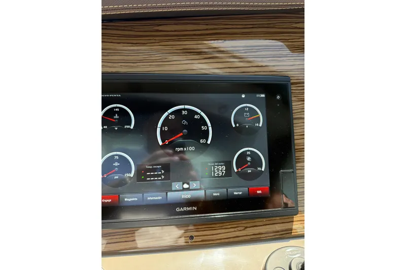 Slide: The Image of Garmin display on 2018 Cruisers Cantius 45 showing engine gauges and controls. - 23