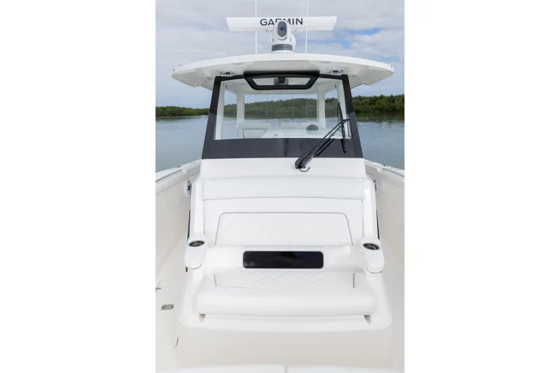 Slide: The Image of 2026 Pursuit S 328 Sport boat interior with seating and windshield view. - 26