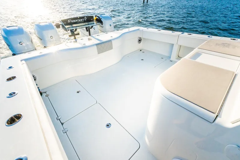 Slide: The Image of Spacious deck of 2022 Freeman 42LR boat with multiple outboard engines. - 51