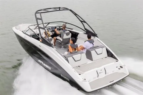Slide: The Image of 2026 Yamaha Boats AR250 cruising on water with passengers enjoying the ride. - 11