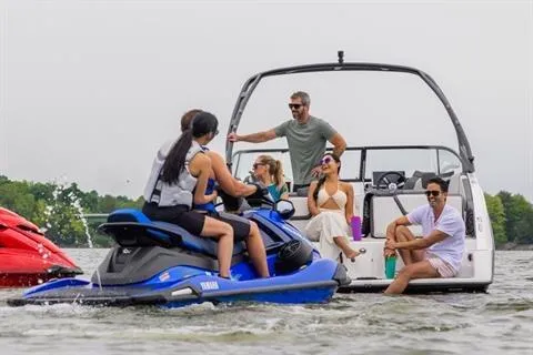 Slide: The Image of Group enjoying Yamaha AR250 boat and jet ski on a lake, 2026 model. - 15