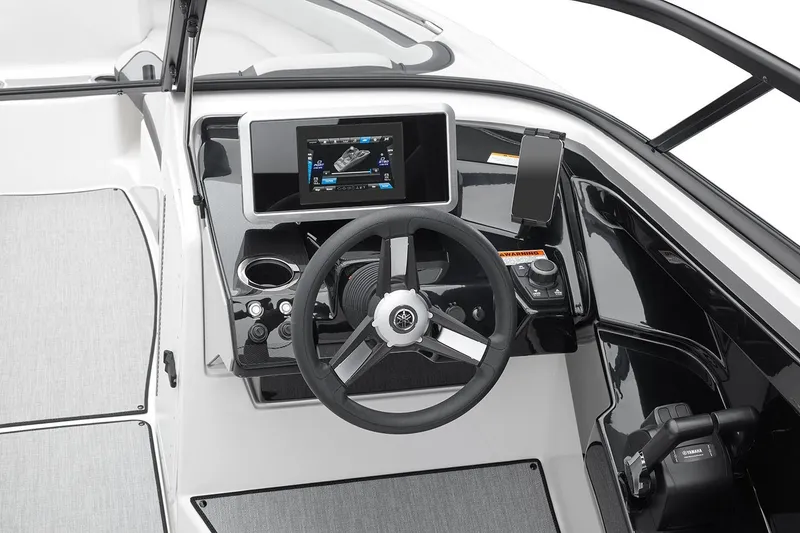 Slide: The Image of Manufacturer Provided Image: 2026 Yamaha Boats AR250 dashboard with steering wheel and touchscreen display. - 6