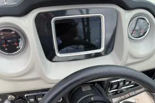 Slide: The Image of 2018 Chapparall Vortex 223 VRX dashboard with steering wheel and gauges. - 10