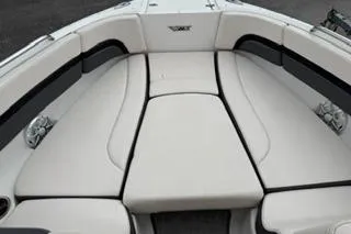 Slide: The Image of 2018 Chapparall Vortex 223 VRX boat interior with cushioned seating. - 11