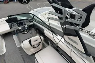 Slide: The Image of 2018 Chapparall Vortex 223 VRX boat interior with sleek dashboard and comfortable seating. - 16