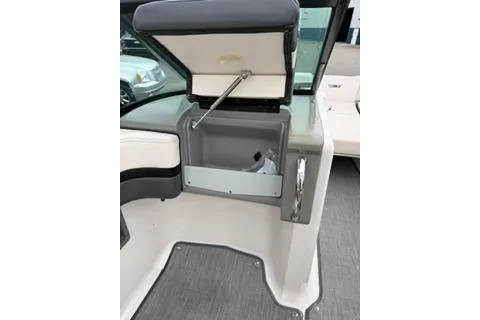 Slide: The Image of 2018 Chapparall Vortex 223 VRX boat interior storage compartment open. - 20