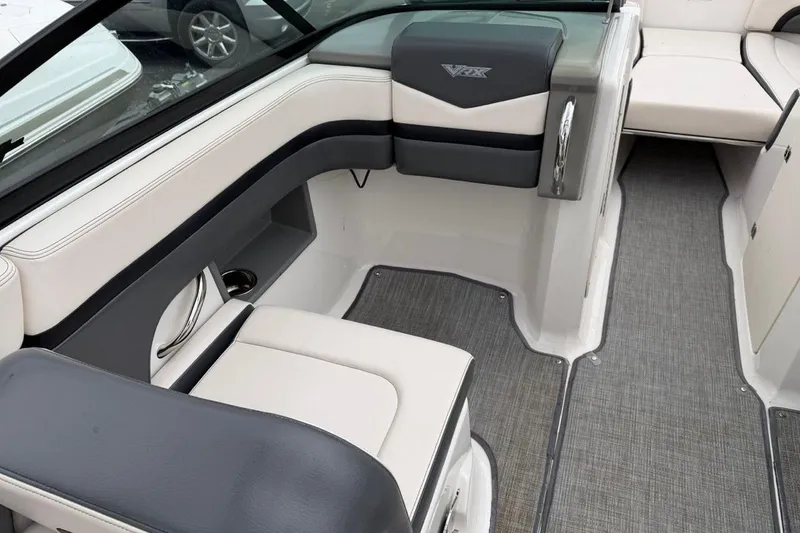 Slide: The Image of 2018 Chaparral Vortex 223 VRX boat interior with sleek seating and modern design. - 6