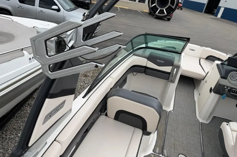 Slide: The Image of 2018 Chaparral Vortex 223 VRX boat interior with seating and dashboard view. - 13