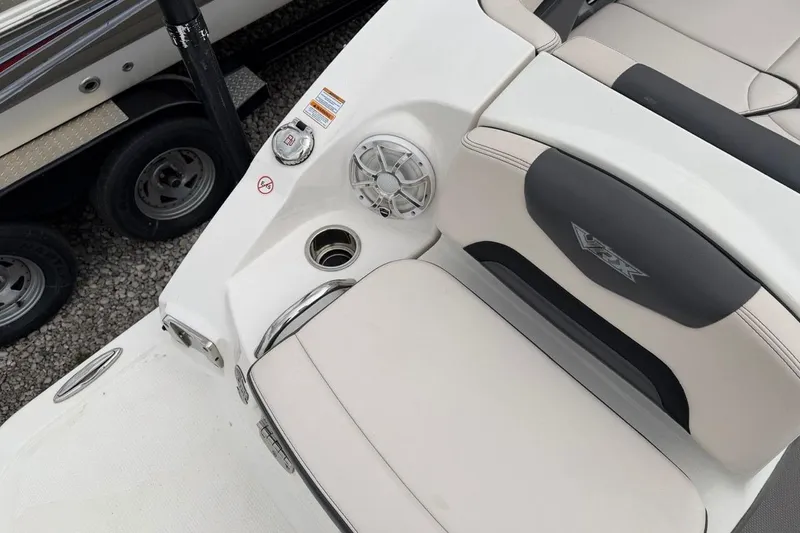 Slide: The Image of 2018 Chaparral Vortex 223 VRX boat interior with seating and speaker detail. - 17