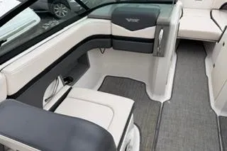 Slide: The Image of 2018 Chapparall Vortex 223 VRX boat interior with sleek seating and modern design. - 8