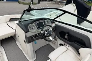 Slide: The Image of 2018 Chapparall Vortex 223 VRX boat interior with modern dashboard and steering wheel. - 9