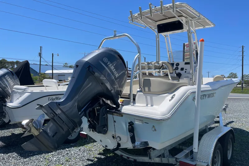 Slide: The Image of 2023 Key West 203 FS boat with Yamaha outboard engine on a trailer. - 3
