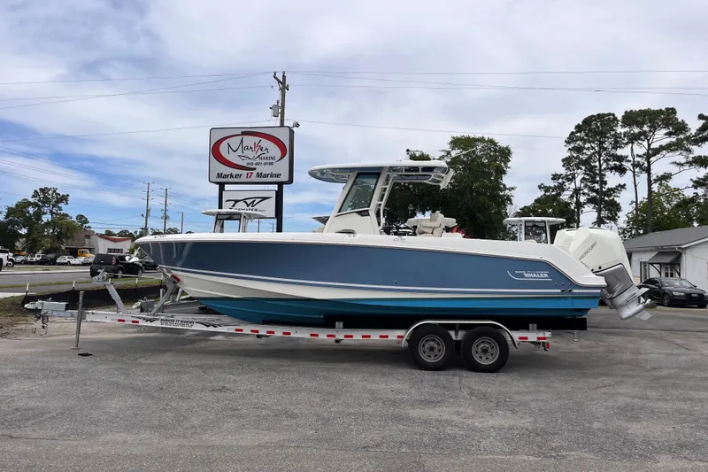 The Image of 2020 Boston Whaler 280 Outrage boat on trailer at Marker 17 Marine dealership. - 0