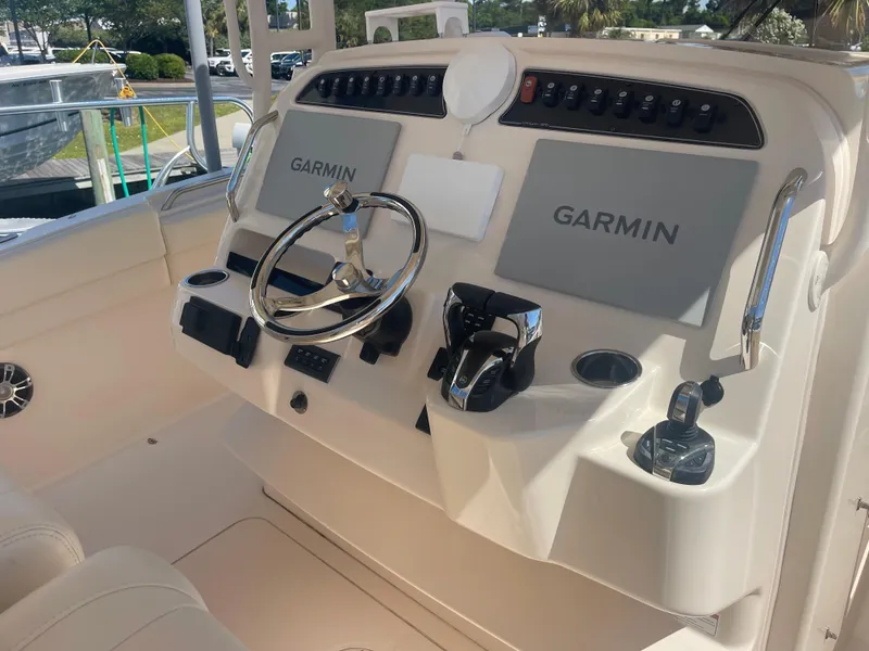 Slide: The Image of Helm console of a 2021 Grady-White Canyon 326 boat. - 11