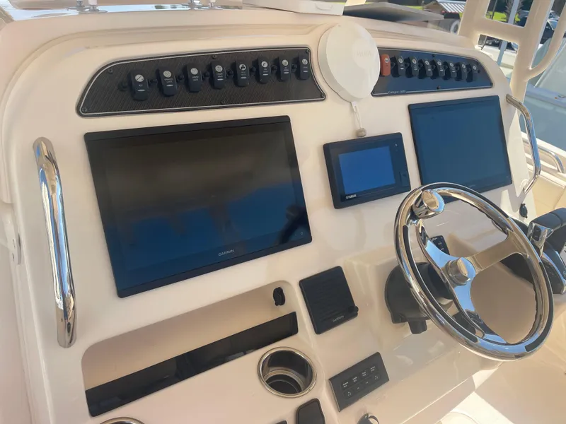 Slide: The Image of Dashboard of Grady-White Canyon 326 boat, year 2021. - 13