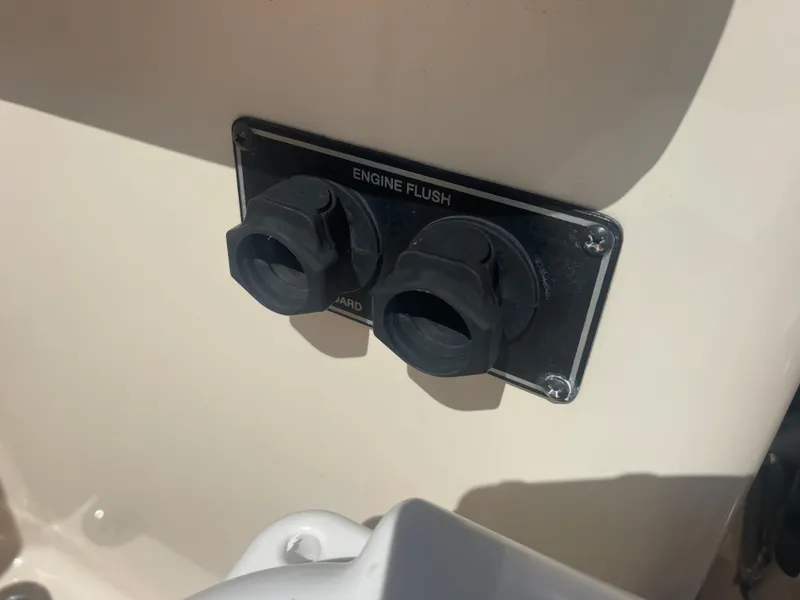 Slide: The Image of Engine flush unit on 2021 Grady-White Canyon 326 boat. - 22