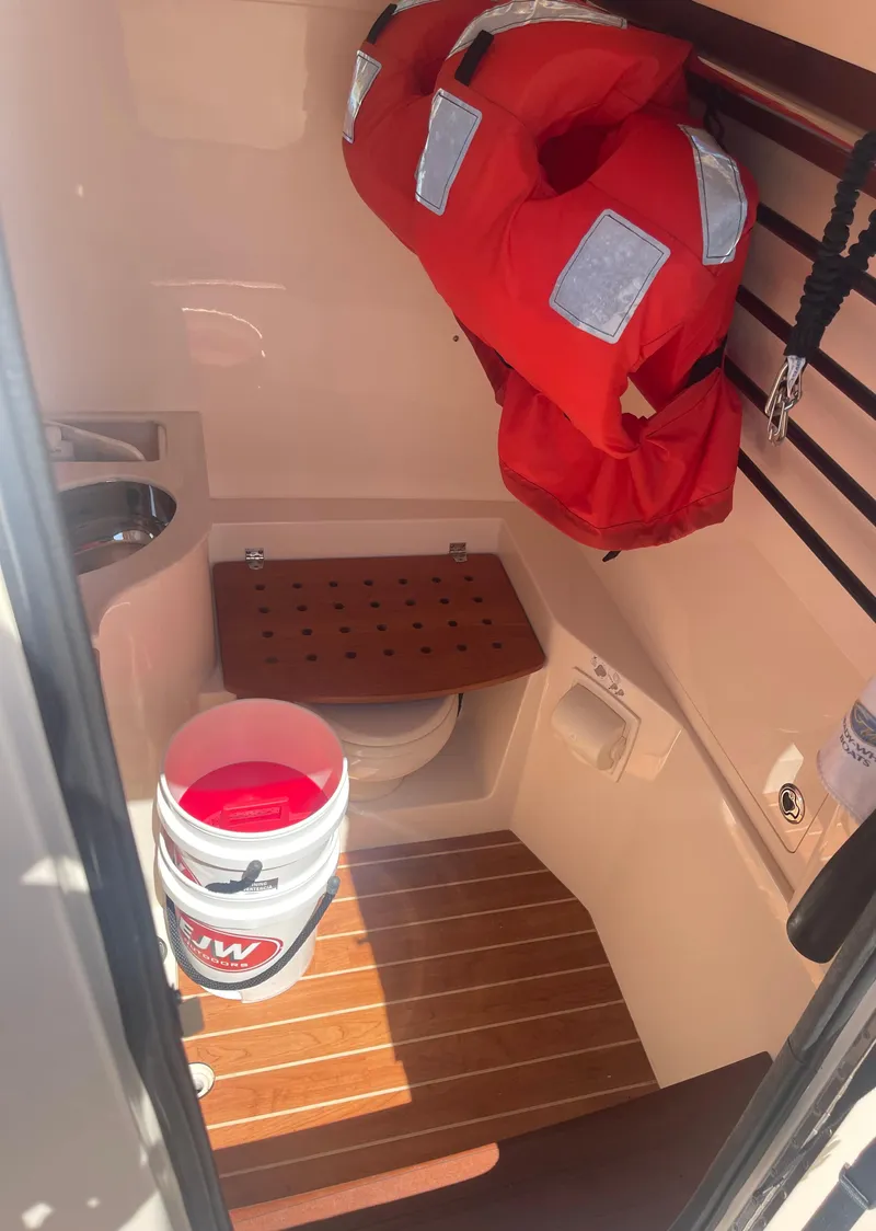 Slide: The Image of Interior of Grady-White Canyon 326 boat with safety equipment. - 24