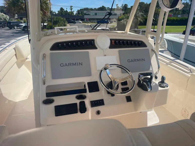 Slide: The Image of 2021 Grady-White Canyon 326 helm with Garmin displays. - 8