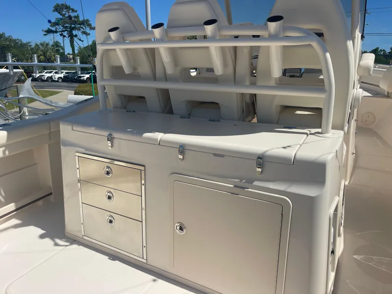 Slide: The Image of 2021 Grady-White Canyon 326 with storage and fishing rod holders. - 9