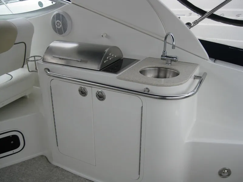 Slide: The Image of Galley on 2009 Sea Ray 270 Sundancer with sink and grill. - 12