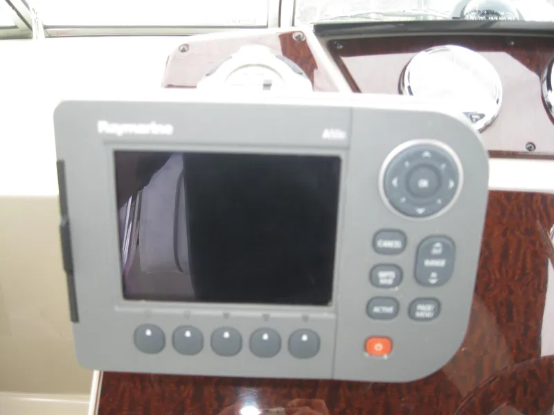 Slide: The Image of Raymarine display on 2009 Sea Ray 270 Sundancer dashboard. - 16