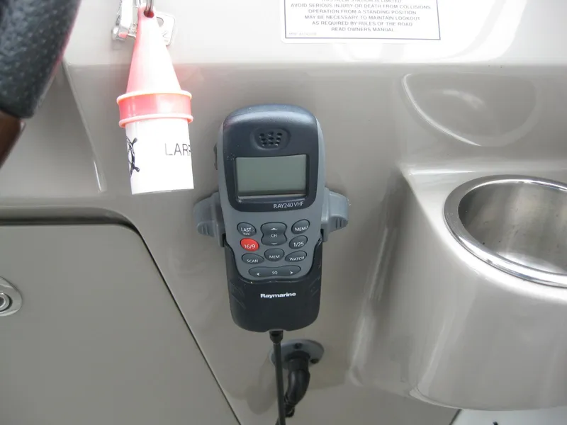 Slide: The Image of Raymarine radio on 2009 Sea Ray 270 Sundancer. - 18