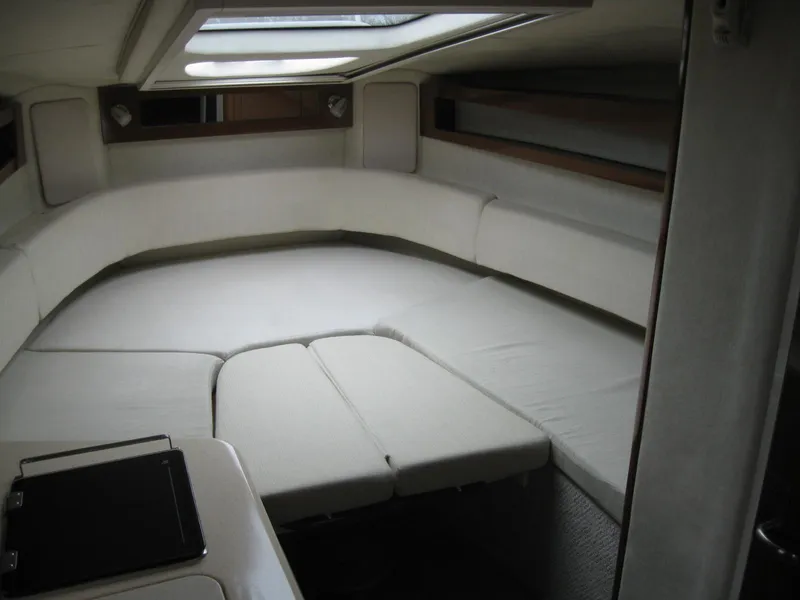 Slide: The Image of Interior of 2009 Sea Ray 270 Sundancer with sleeping area. - 23