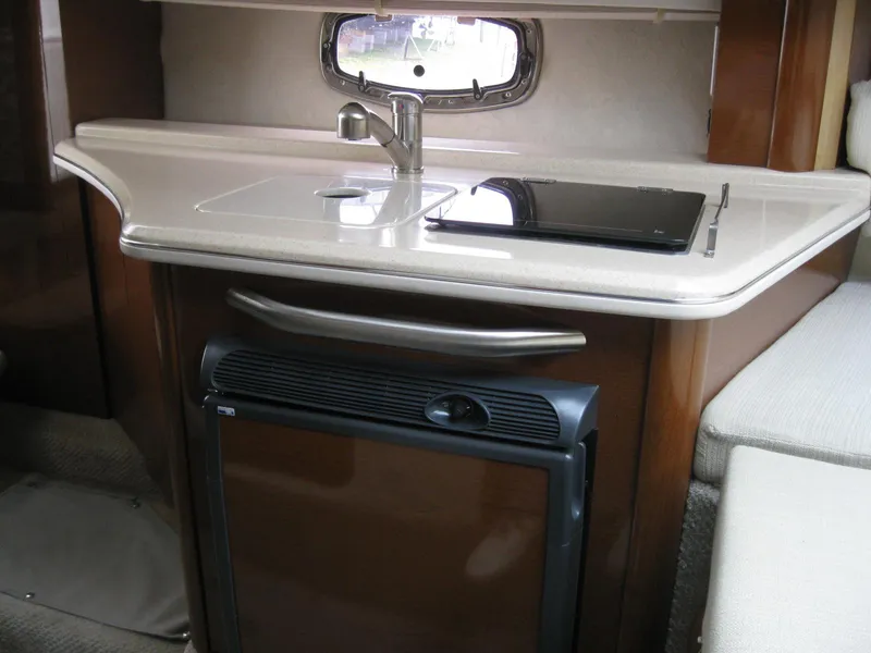 Slide: The Image of Galley in a 2009 Sea Ray 270 Sundancer yacht. - 25