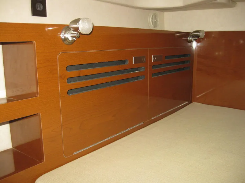 Slide: The Image of Interior of 2009 Sea Ray 270 Sundancer with wood paneling. - 30