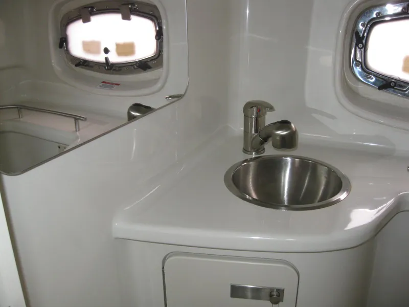 Slide: The Image of Interior of 2009 Sea Ray 270 Sundancer with sink. - 32