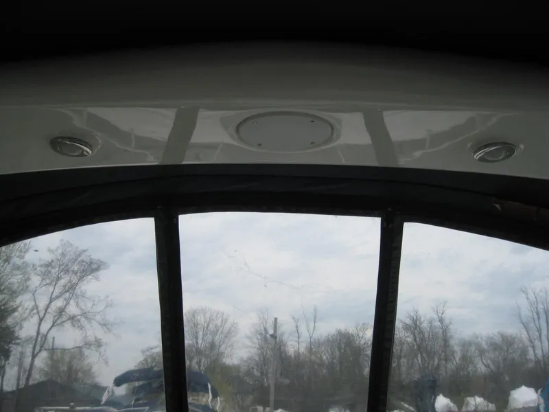 Slide: The Image of Interior view of 2009 Sea Ray 270 Sundancer with windows and sky. - 38