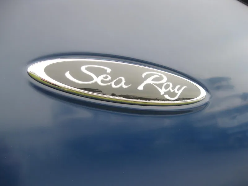 Slide: The Image of Sea Ray 270 Sundancer 2009 logo on blue background. - 5