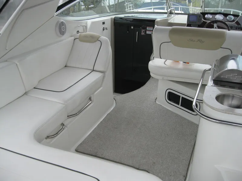 Slide: The Image of Interior of 2009 Sea Ray 270 Sundancer with white upholstery. - 9