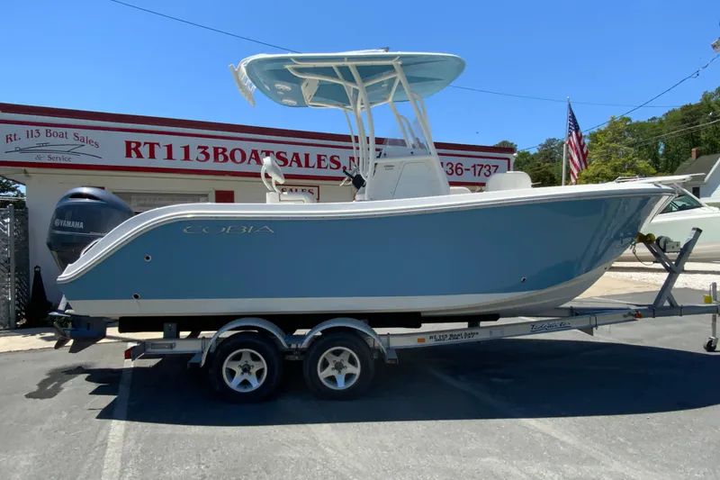 The Image of 2021 Cobia 220 Center Console boat on trailer at RT113 Boat Sales. - 1
