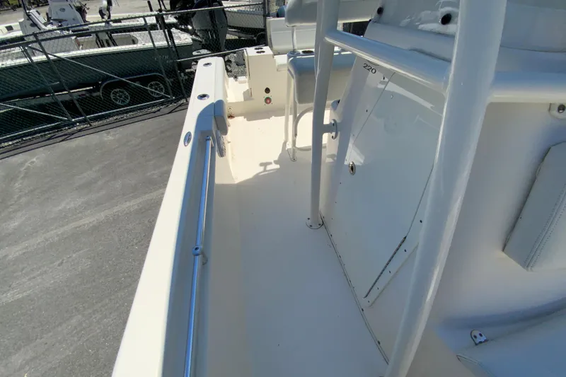 Slide: The Image of 2021 Cobia 220 Center Console boat interior with sleek design and spacious layout. - 26