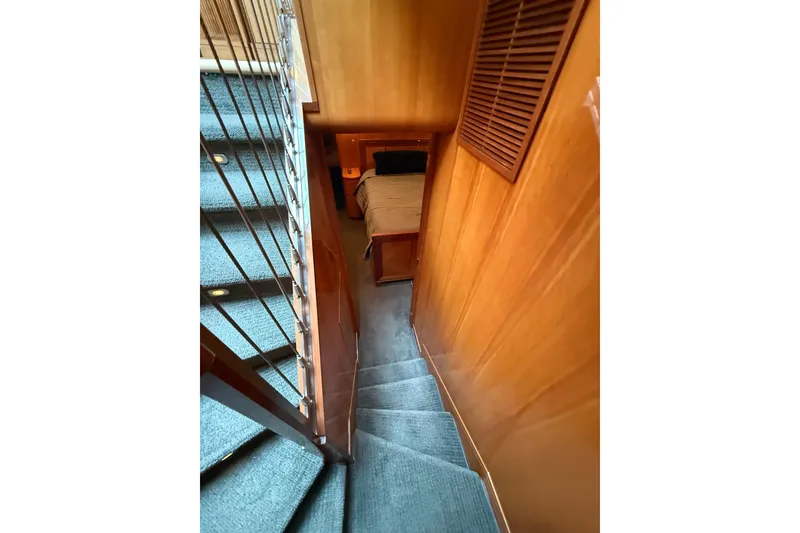 Slide: The Image of Staircase leading to cabin in 2004 Queenship 76 Baretta yacht interior. - 46