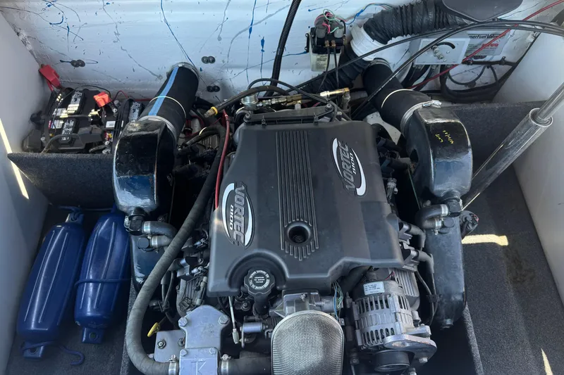 Slide: The Image of Engine compartment of a 2007 Commander 2300LX boat with Vortec engine. - 17